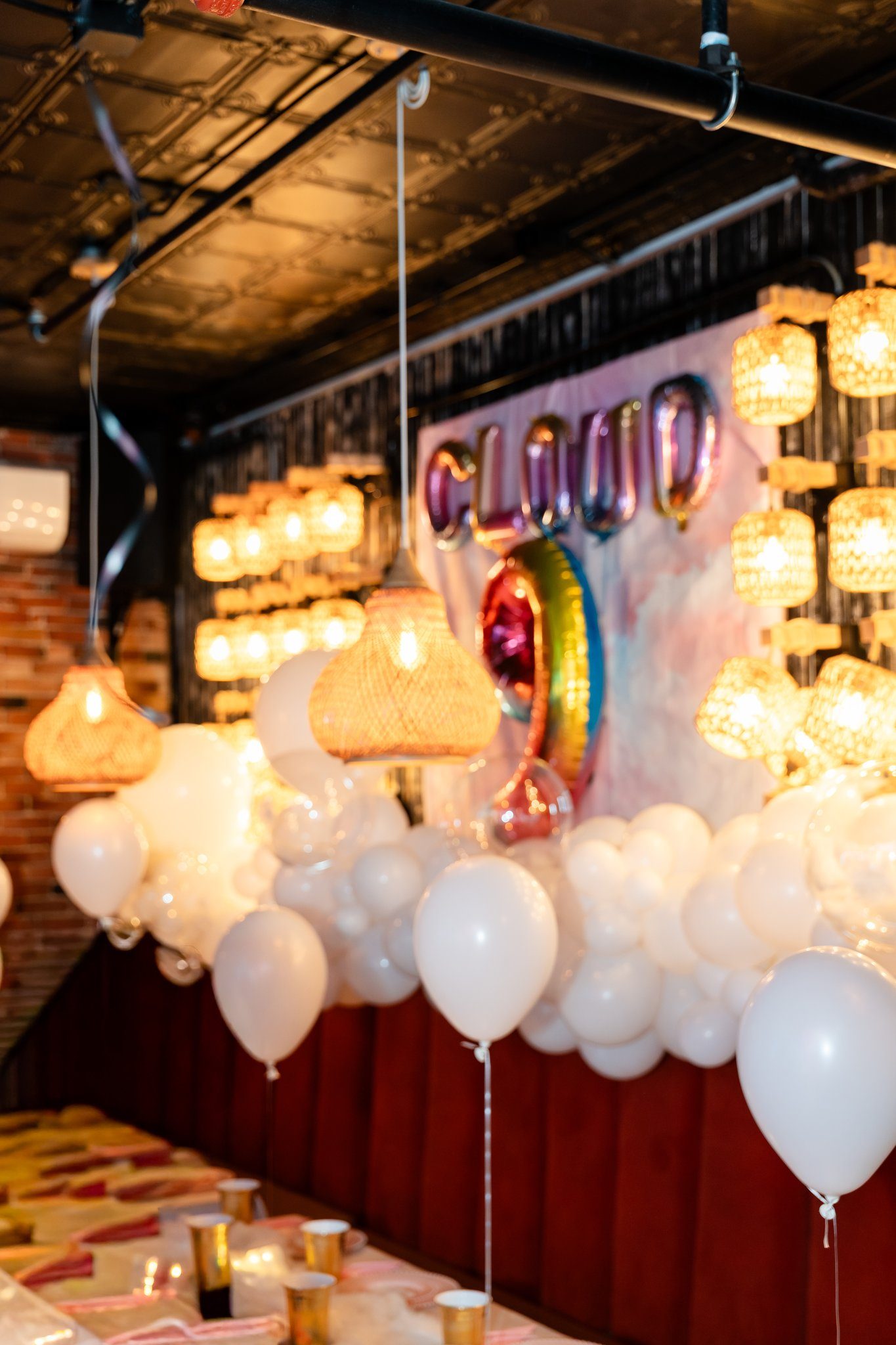 Balloons floating above the table setting